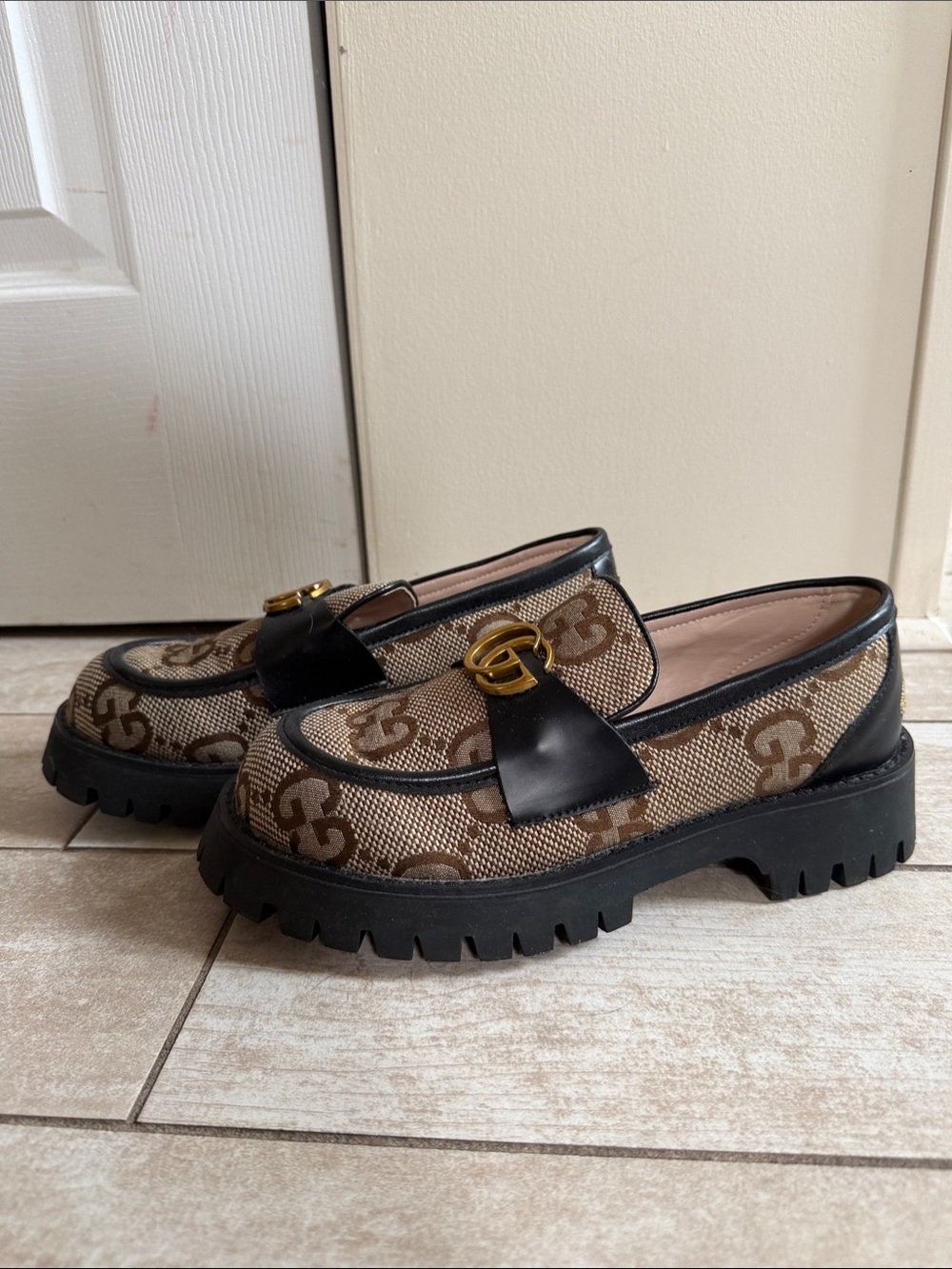 Gucci Brown GG Canvas and Black Trim Lug Sole Loafers